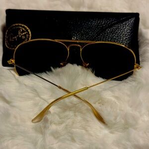 Ray Bans! Black and gold aviator sunglasses.